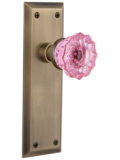 New York Door Set with Colored Fluted Crystal Glass Knobs Pink in Antique Brass.